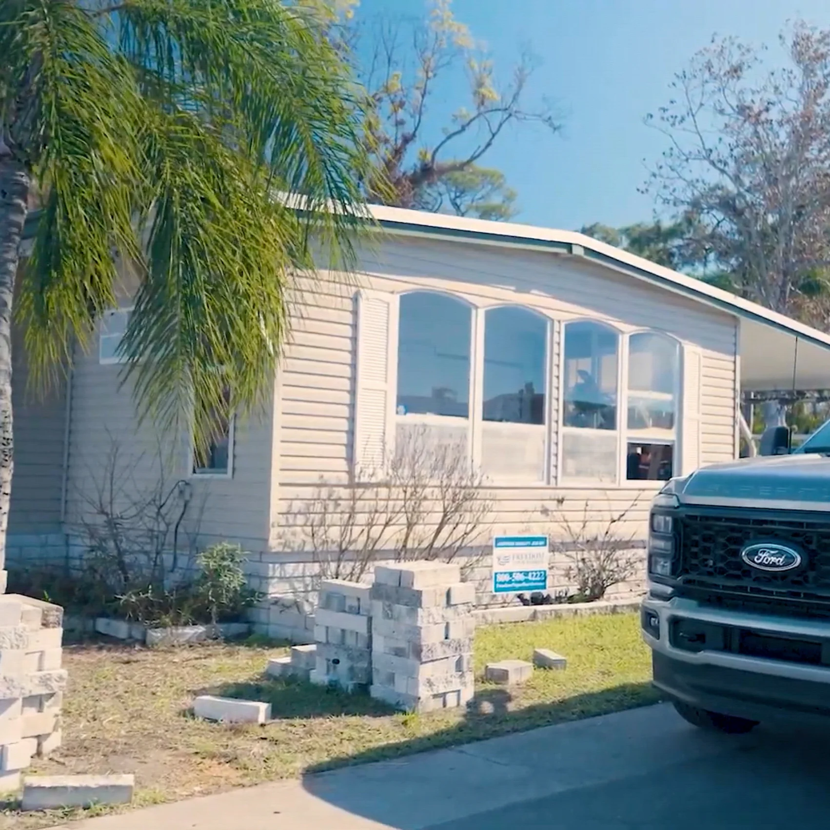 Vapor barrier installation under a Clearwater mobile home